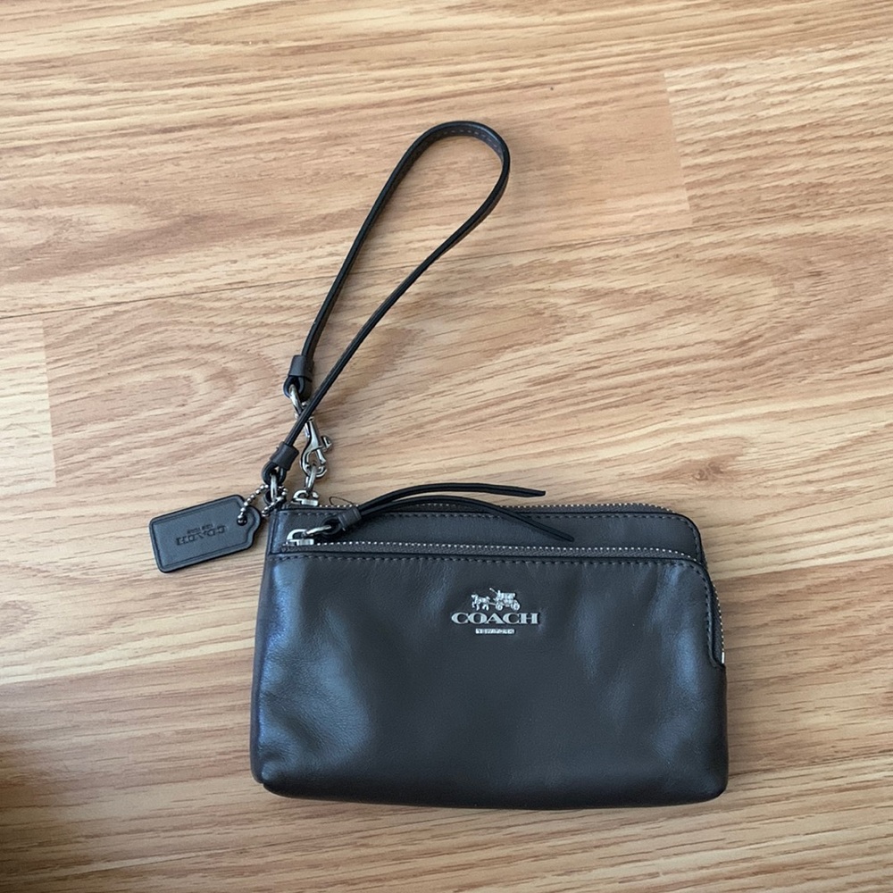 Coach clutch handbag. Muted brown color. In great condition.